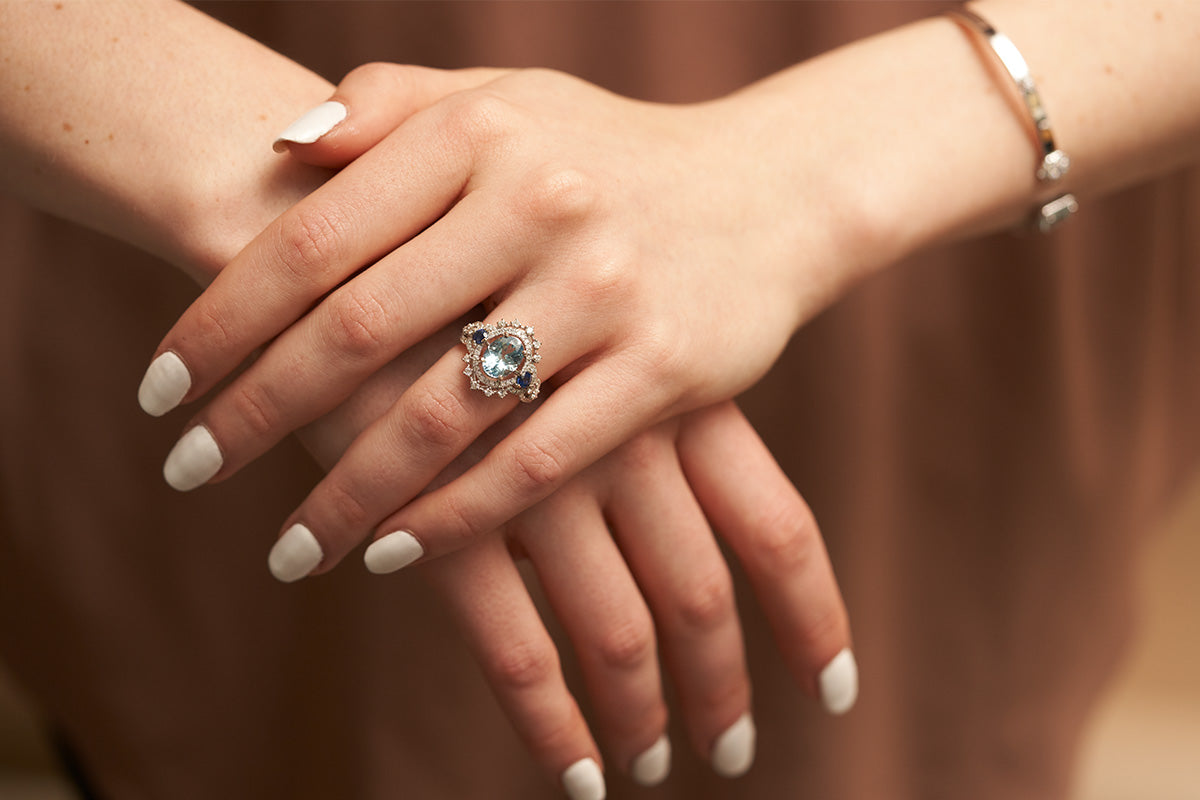 Woman Wearing Aquamarine Ring from Park City Jewelers