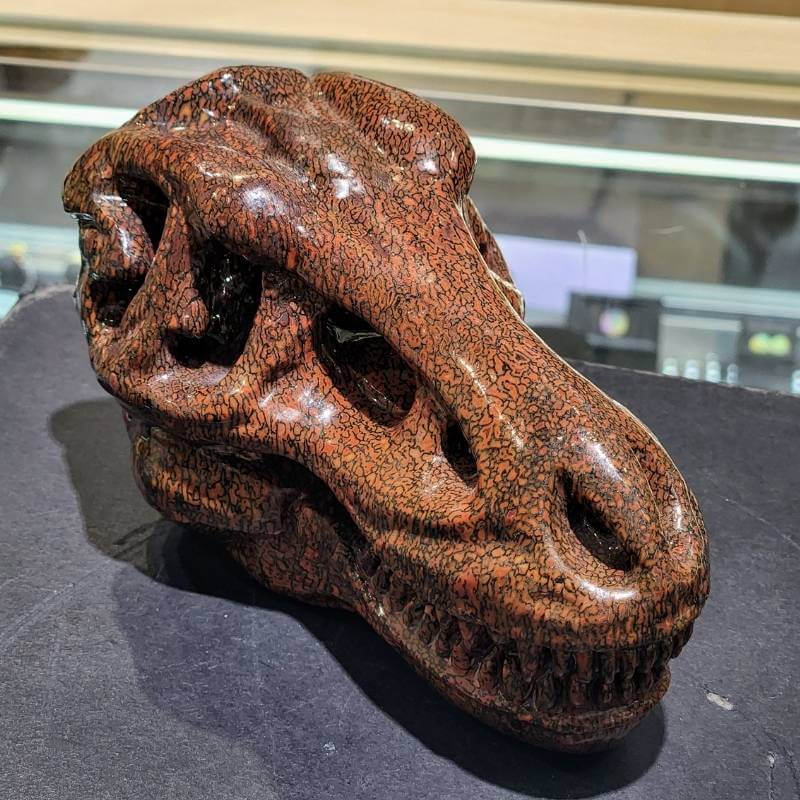 Carved dinosaur bone T-Rex Head from Park City Jewelers.