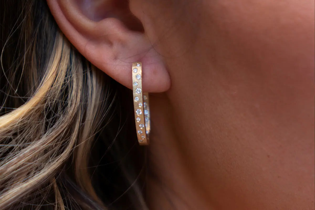 Woman Wearing Confetti Earrings from Park City Jewelers