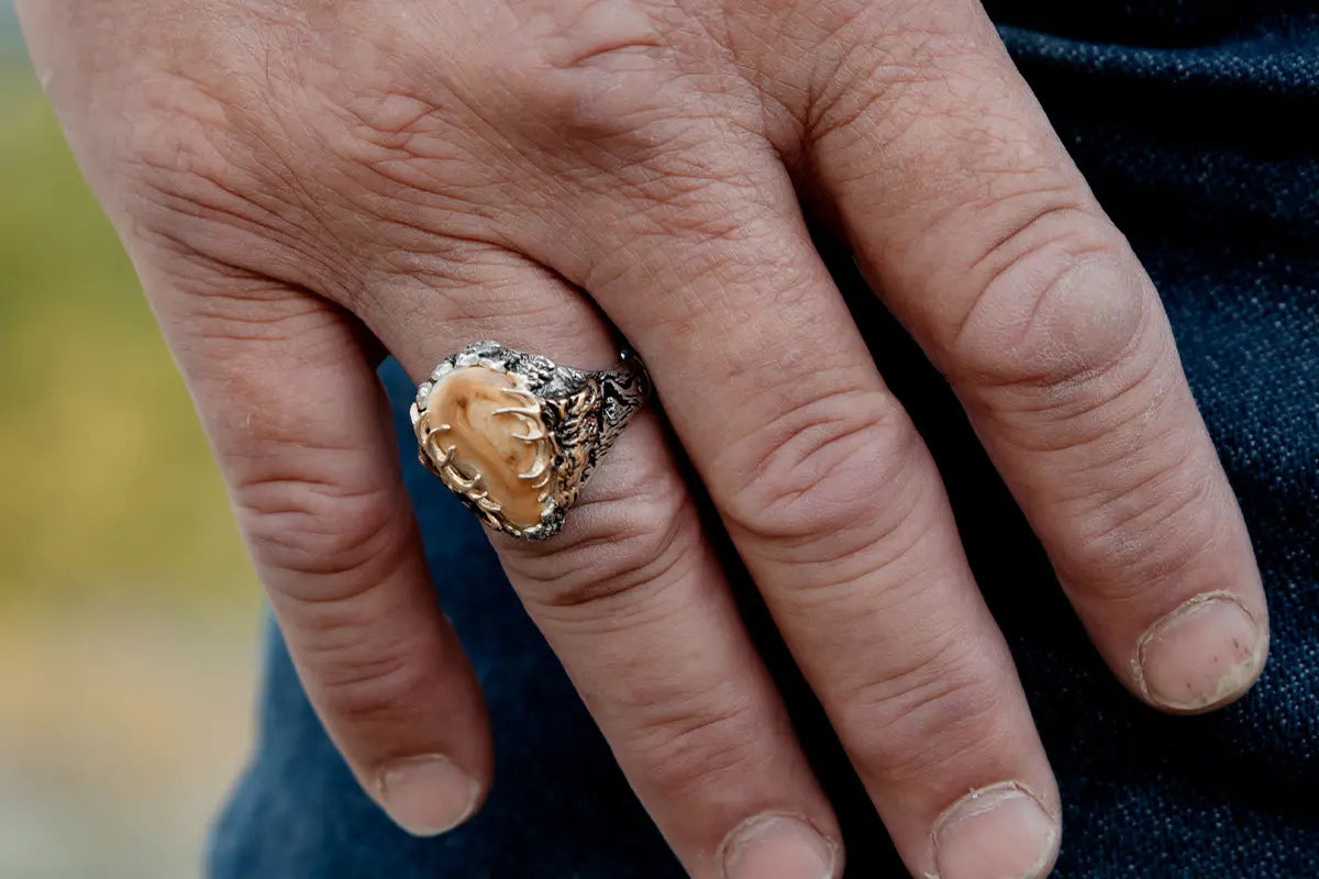 Man Wearing Elk Ivory Trophy Ring from Park City Jewelers.
