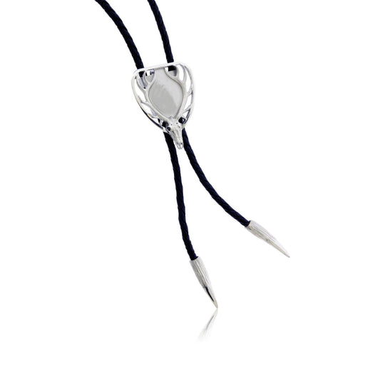 The sculptural sterling silver bolo tie slide in an abstract elk head design, shown as the primary option without a center stone.