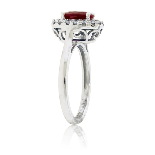 Oval Ruby and Diamond Halo Ring