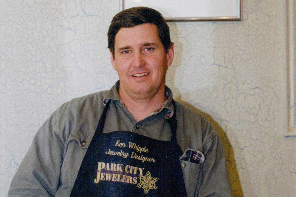 Ken Whipple Sitting in His Jeweler's Apron - Park City Jewelers.