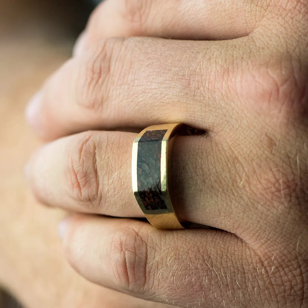 Man WEaring Dinosaur Bone Inlay Ring - Park City Jewelers
