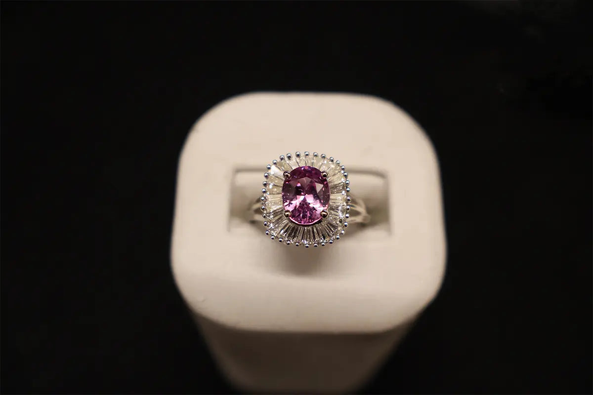 Pink Sapphire Ring with Baguette Diamonds from Park City Jewelers