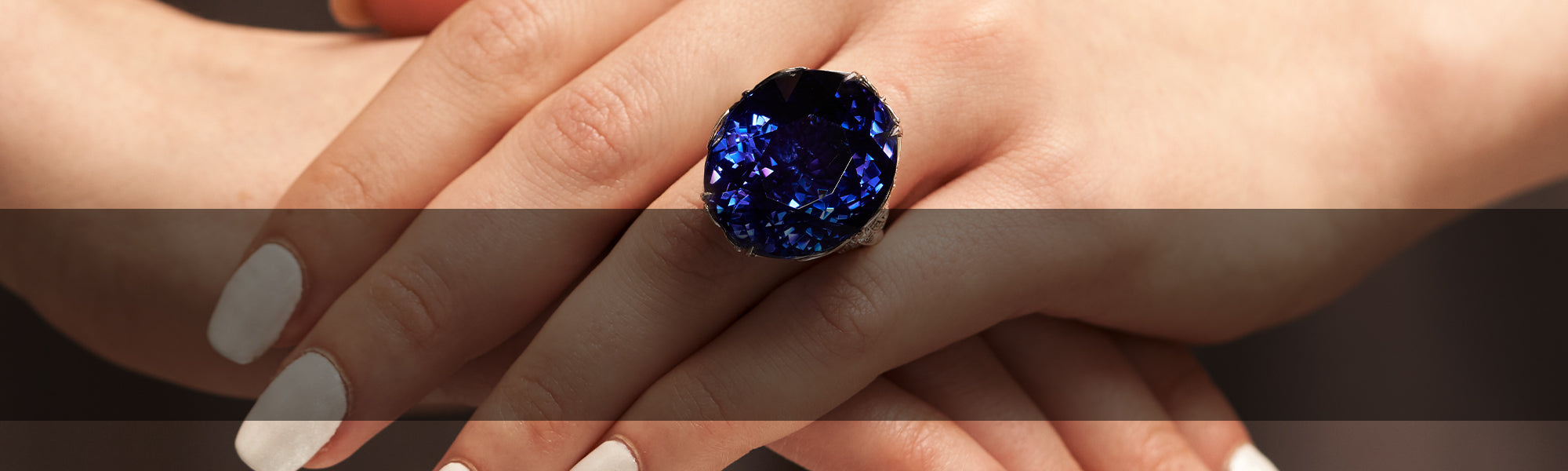 Woman Wearing Tanzanite Ring by Park City Jewelers