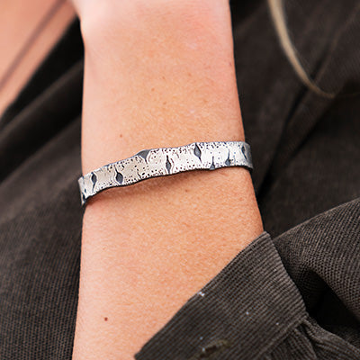 Woman wearing sterling silver Wolfgang Vaatz aspen bracelet