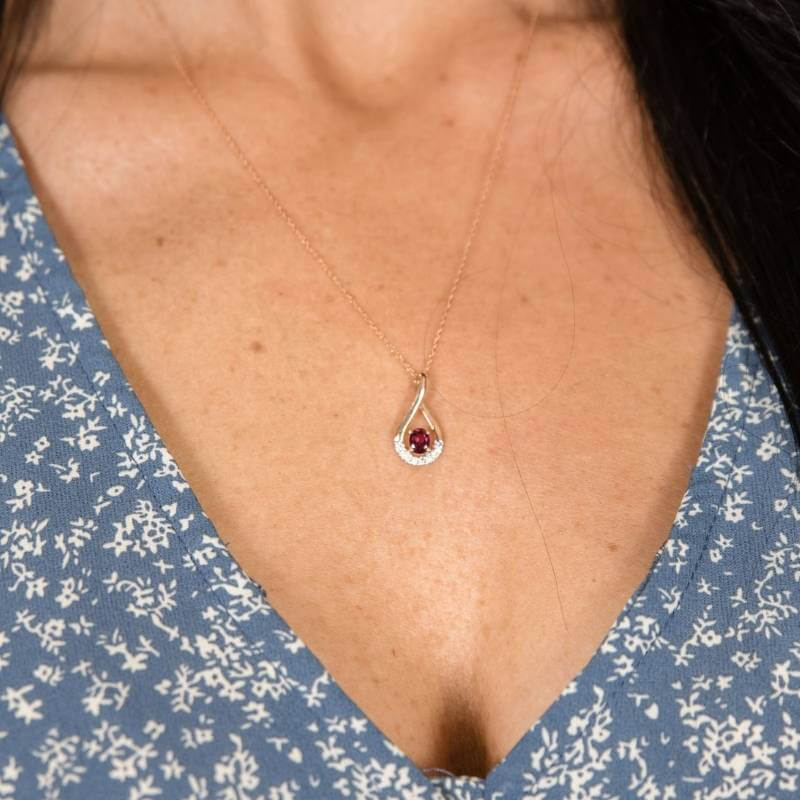 Woman wearing garnet necklace