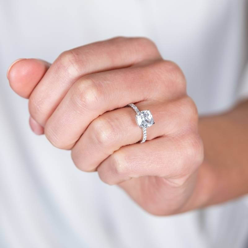 Woman wearing moissanite ring - Park City Jewelers.