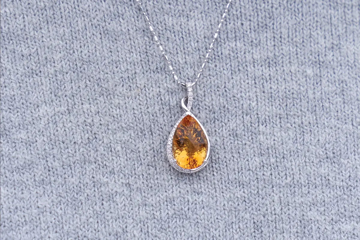 Woman Wearing Citrine Pendant from Park City Jewelers