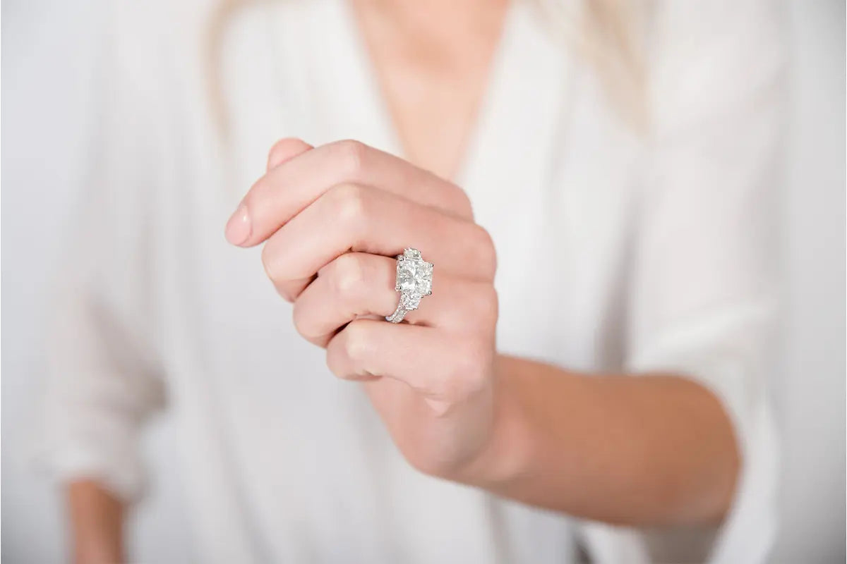 Woman Wearing a Large Diamond Ring from Park City Jewelers.