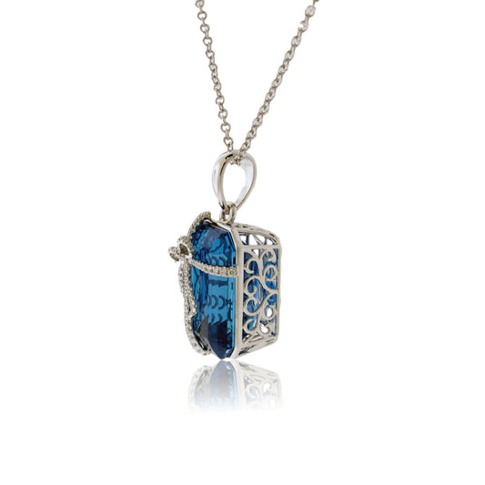 Blue Topaz & Diamond Bow Pendant with Chain - Park City Jewelers