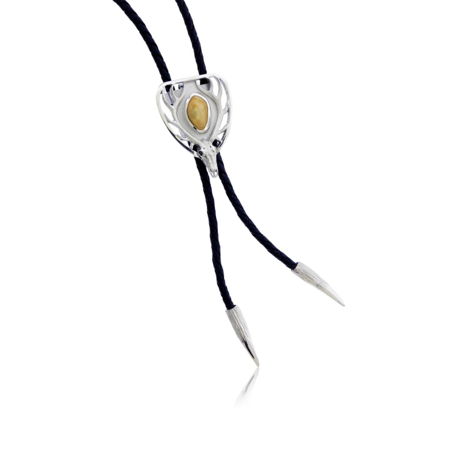 Close-up of the sterling silver elk head bolo tie, featuring a polished elk ivory set in the center of the abstract antler design.