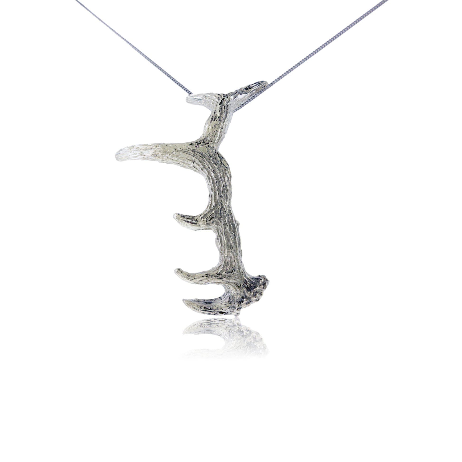 Large elk antler shed style pendant in silver, displayed on a white background with optional chain lengths available - Park City Jewelers