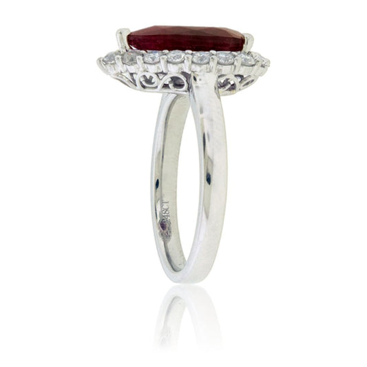 Pear Cut Red Emerald and Diamond Halo Ring - Park City Jewelers