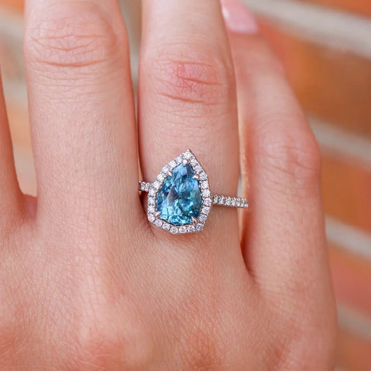 Pear - Shaped Blue Zircon & Diamond Halo Ring - Park City Jewelers