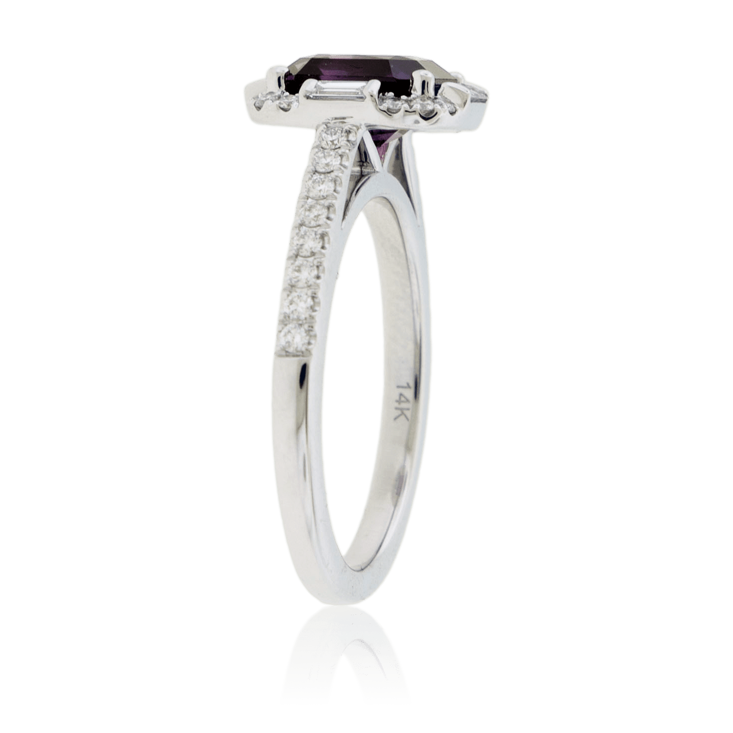 Angled view of an Art Deco purple sapphire and diamond ring, highlighting the geometric halo and the pavé-set diamond band in 14K white gold.