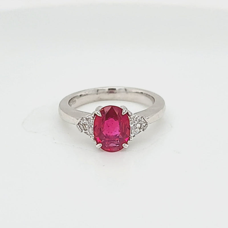 Oval Shaped Ruby and Shield Diamond Ring