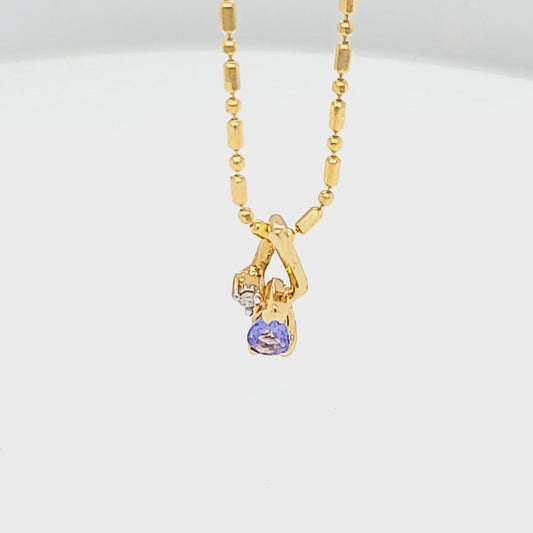 Pear Shaped Tanzanite Pendant with Diamond Accent