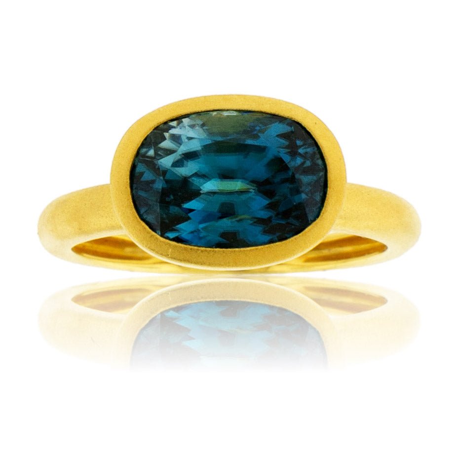 Bezel Set Modified Cushion-Cut Blue Zircon Yellow Gold Ring - Park City Jewelers