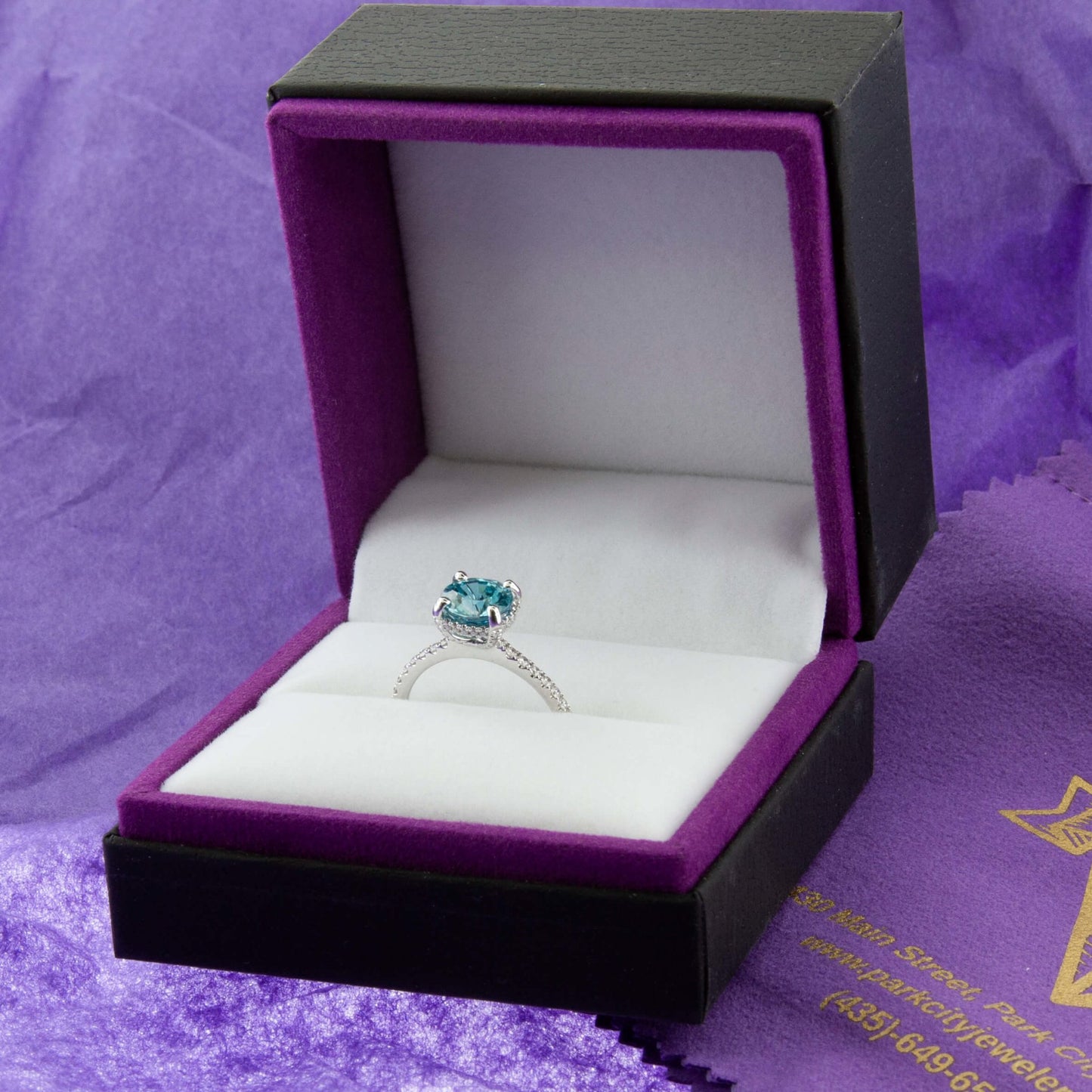 Blue Zircon Modern Halo and Diamond Accented Ring - Park City Jewelers