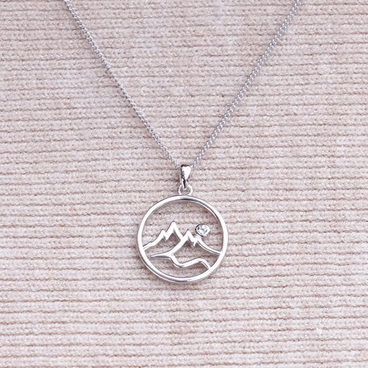 Circle Mountain Silhouette with Blue Topaz Accent Pendant - Park City Jewelers