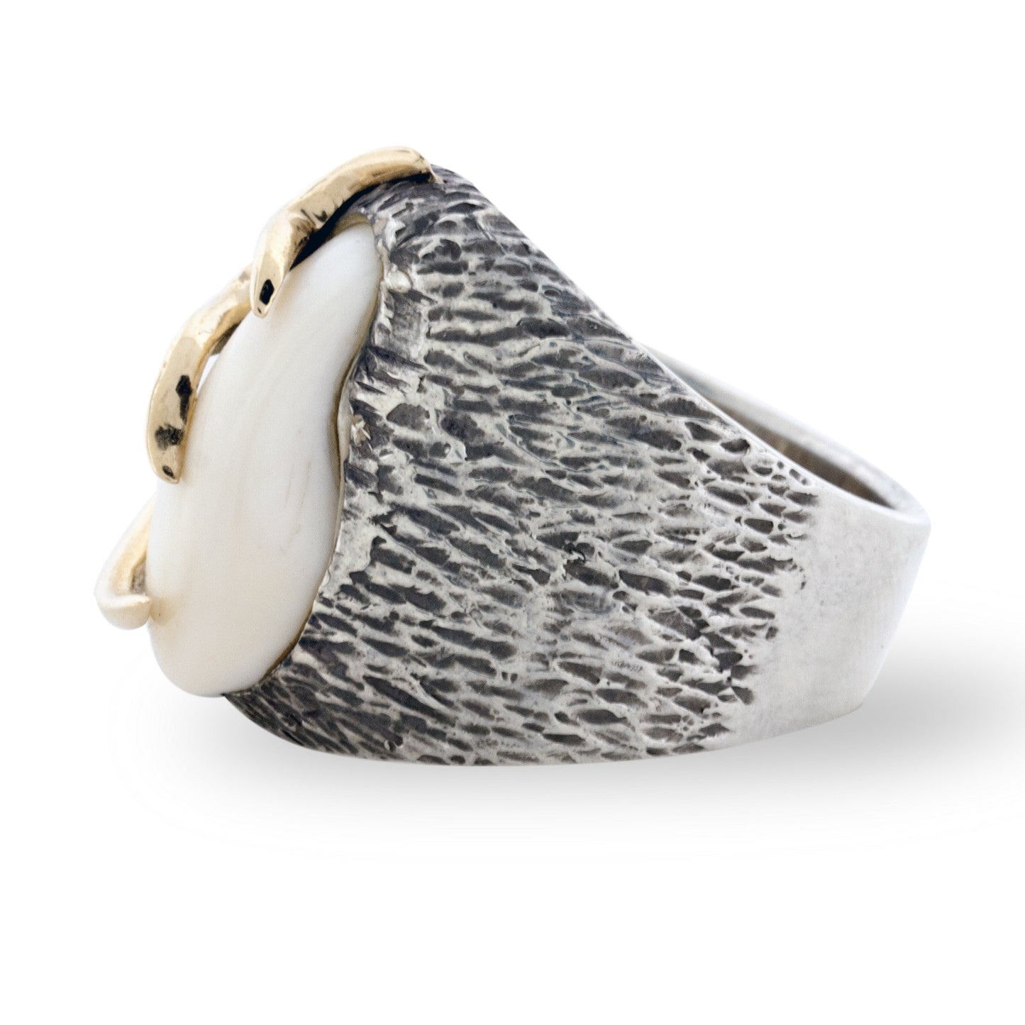 Side profile of the custom elk ivory trophy ring, showcasing the deep, bark-like texture of the wide sterling silver band.