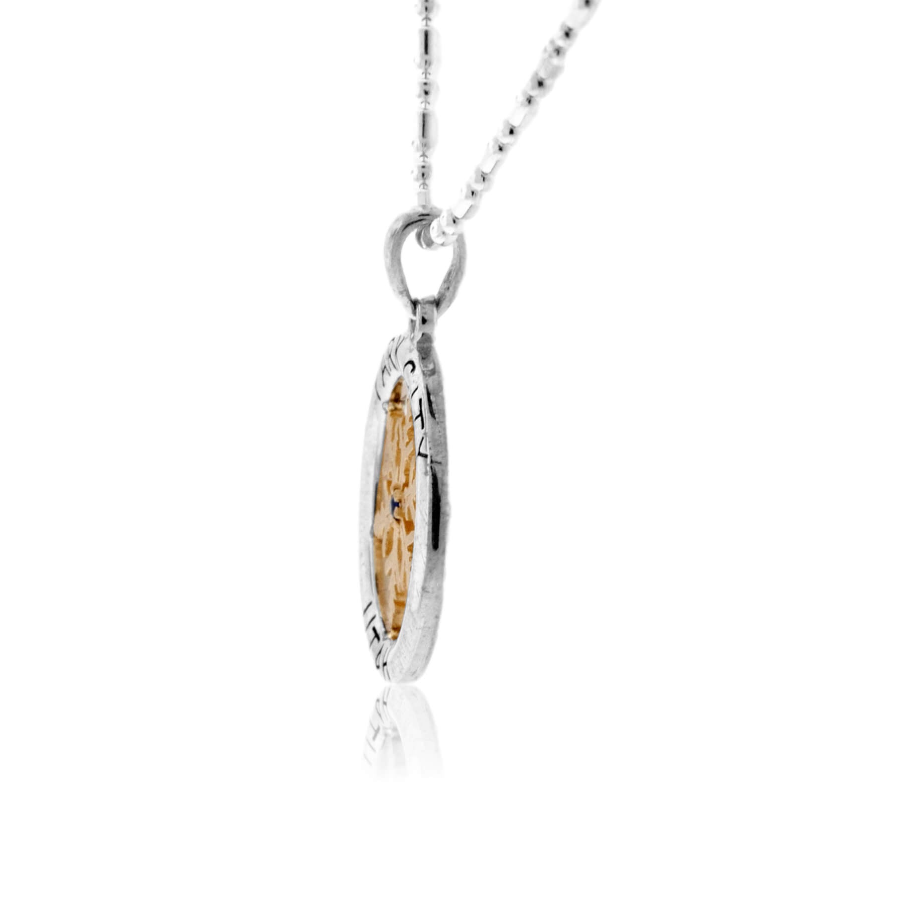 Gold Sapphire Center Snowflake in Sterling Silver Circle - Park City Jewelers