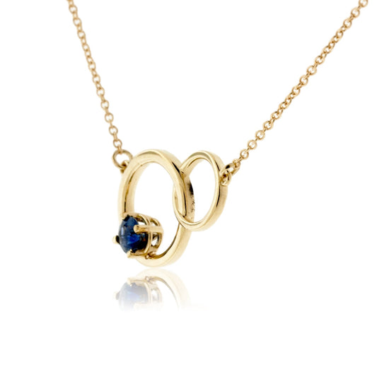 Interlocking Circle with Sapphire Pendant - Park City Jewelers