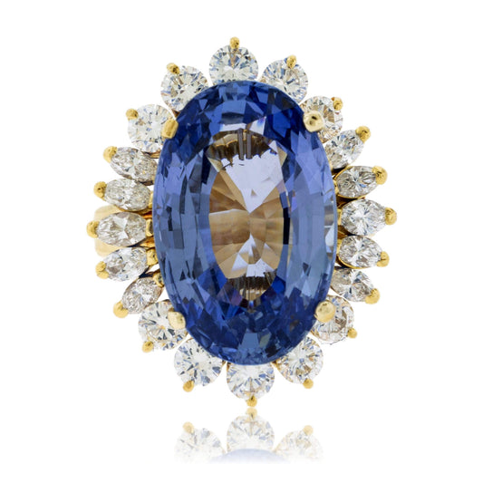 Large Oval Blue Sapphire with Round and Marquise Diamond Halo Style Ring - Park City Jewelers
