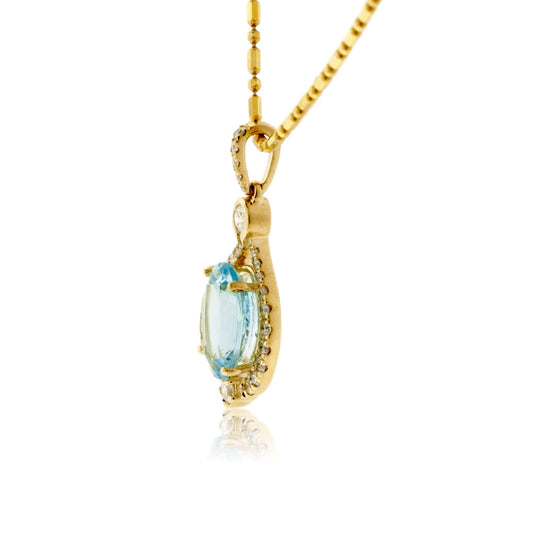 Oval Aquamarine & Diamond Halo Pendant - Park City Jewelers
