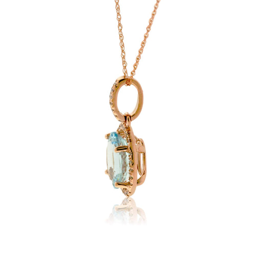 Oval Aquamarine & Diamond Halo Pendant - Park City Jewelers