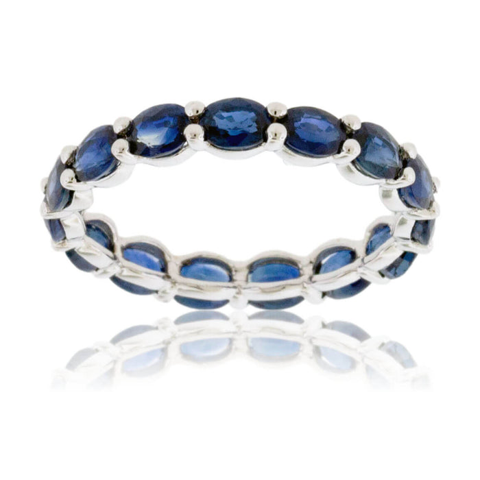 Oval Blue Sapphire Eternity Style Ring - Park City Jewelers