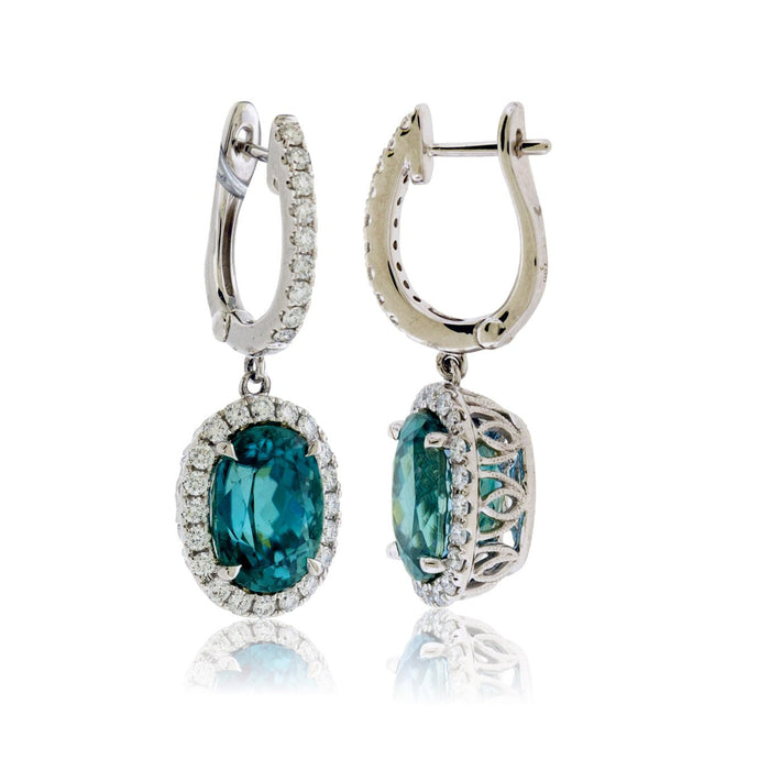 Oval Blue Zircon & Diamond Halo Dangle Earrings - Park City Jewelers