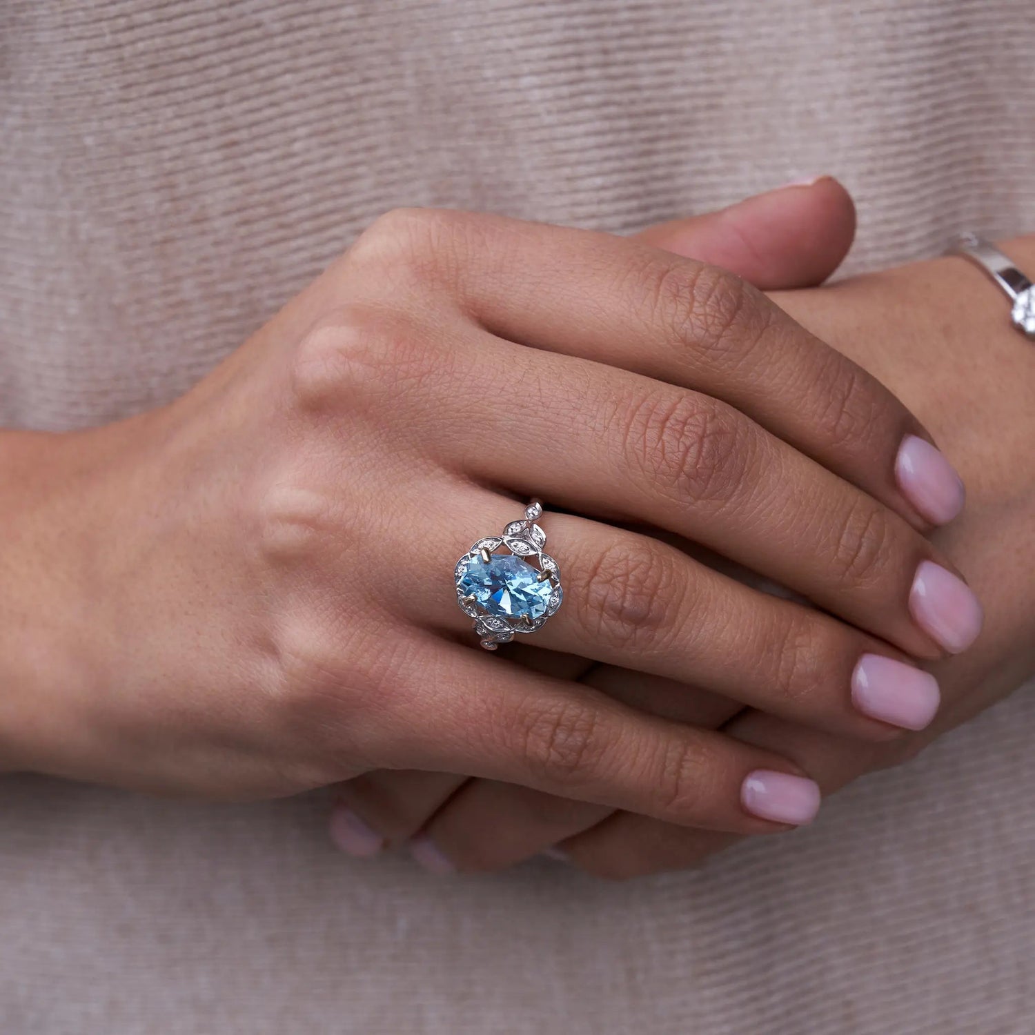 Oval-Cut Aquamarine with Scalloped Diamond Halo Ring - Park City Jewelers