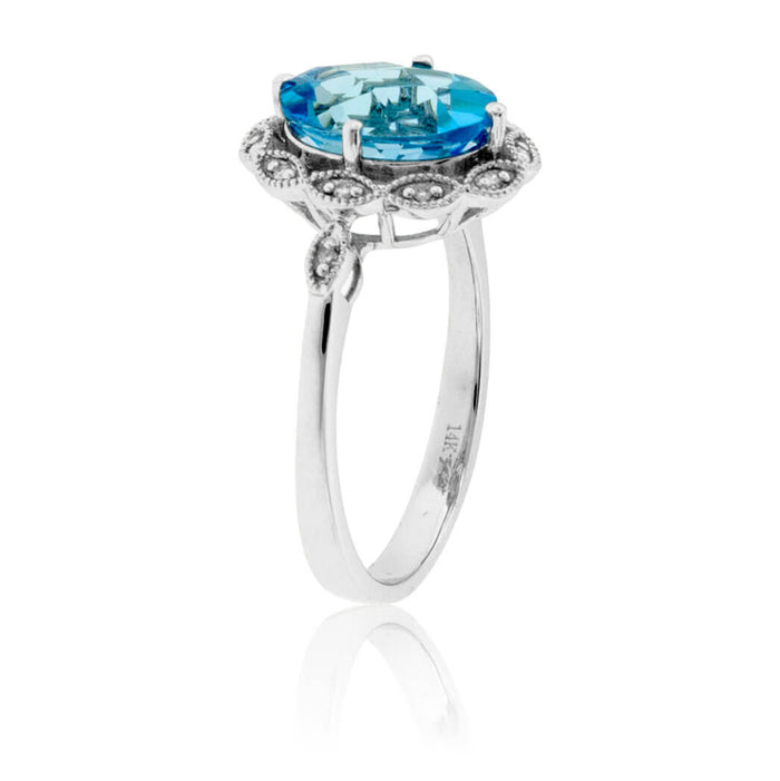 Oval Cut Blue Topaz with Diamond Scalloped Halo Ring - Park City Jewelers