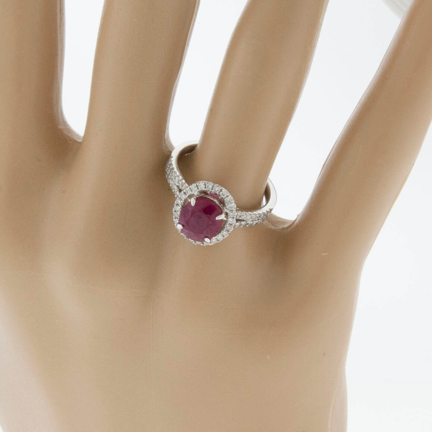 Oval Ruby and Split Shank Diamond Halo Ring - Park City Jewelers