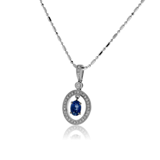 Oval Shaped Sapphire with Diamond Halo Pendant - Park City Jewelers