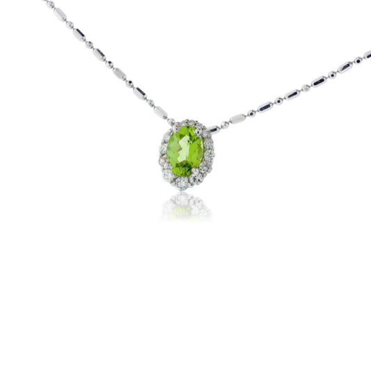 Peridot and Classic-Style Diamond Halo Pendant - Park City Jewelers