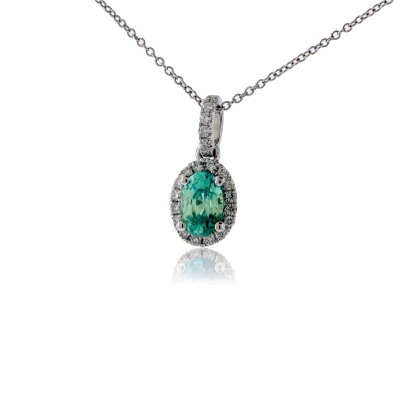 Simple Oval Blue Zircon in Diamond Halo Pendant - Park City Jewelers