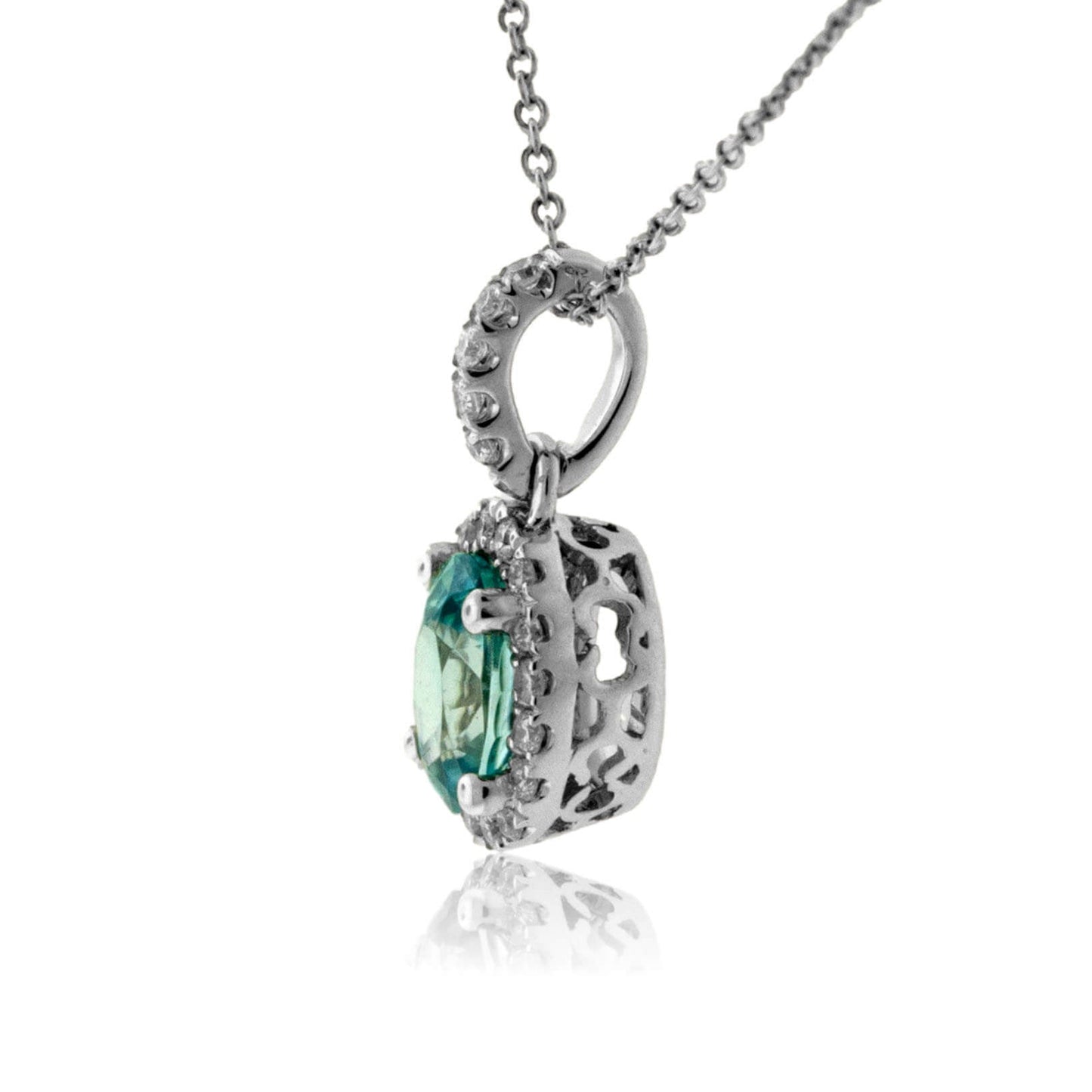 Simple Oval Blue Zircon in Diamond Halo Pendant - Park City Jewelers