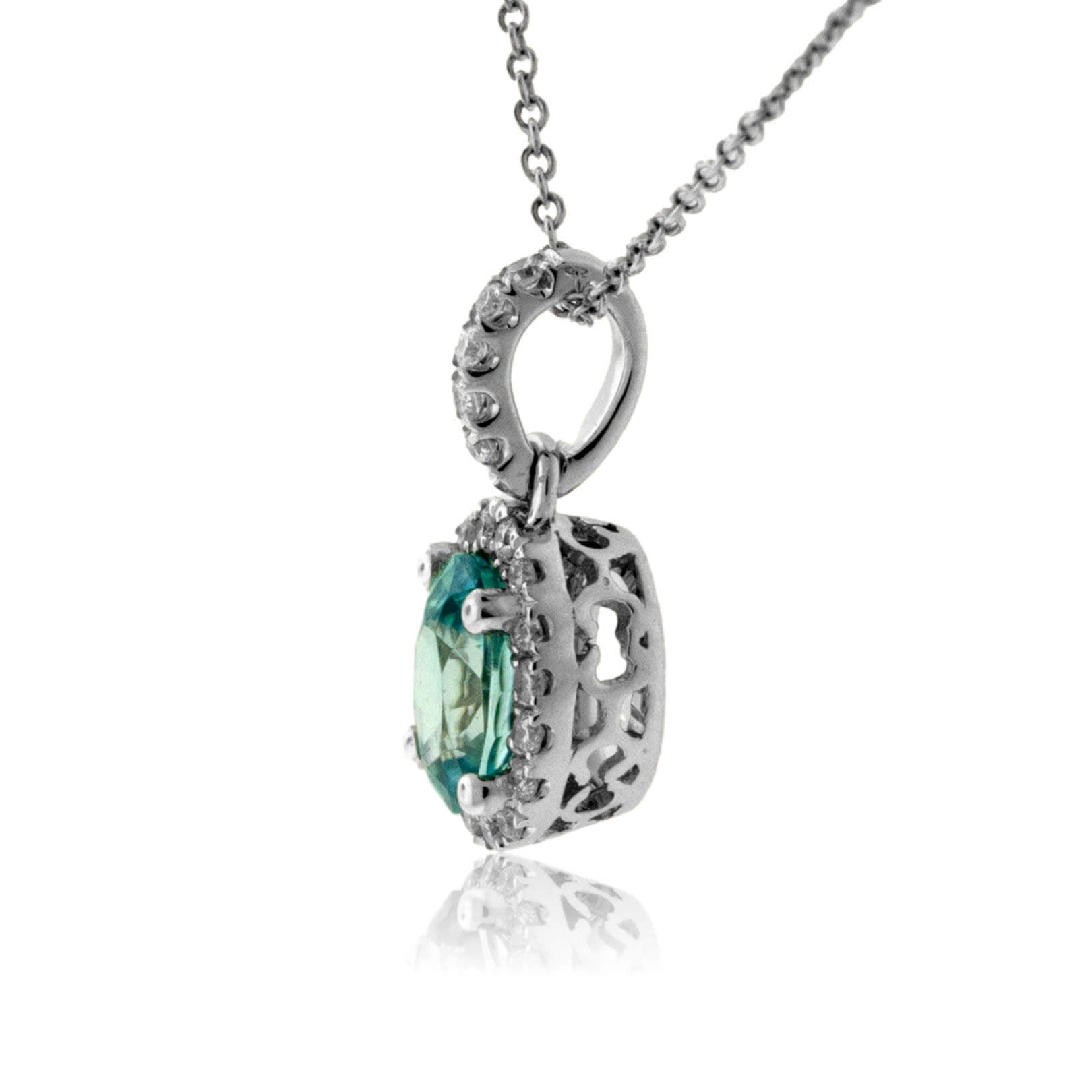 Simple Oval Blue Zircon in Diamond Halo Pendant - Park City Jewelers