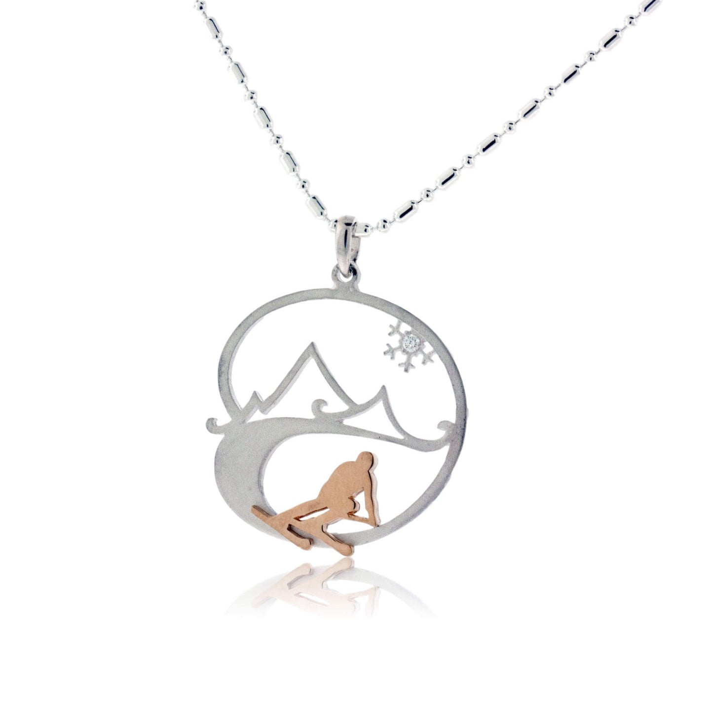Skier in the Mountains with Snowflake Pendant - Park City Jewelers