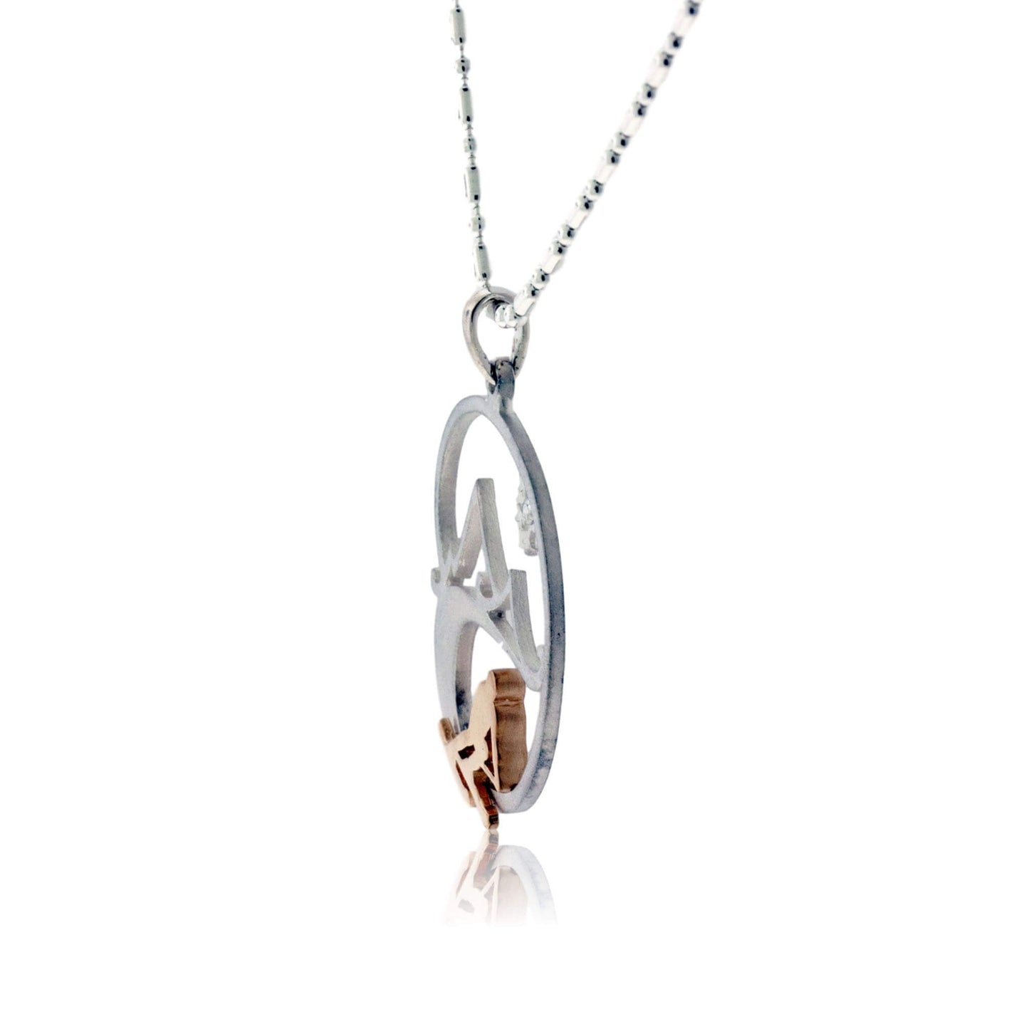 Skier in the Mountains with Snowflake Pendant - Park City Jewelers