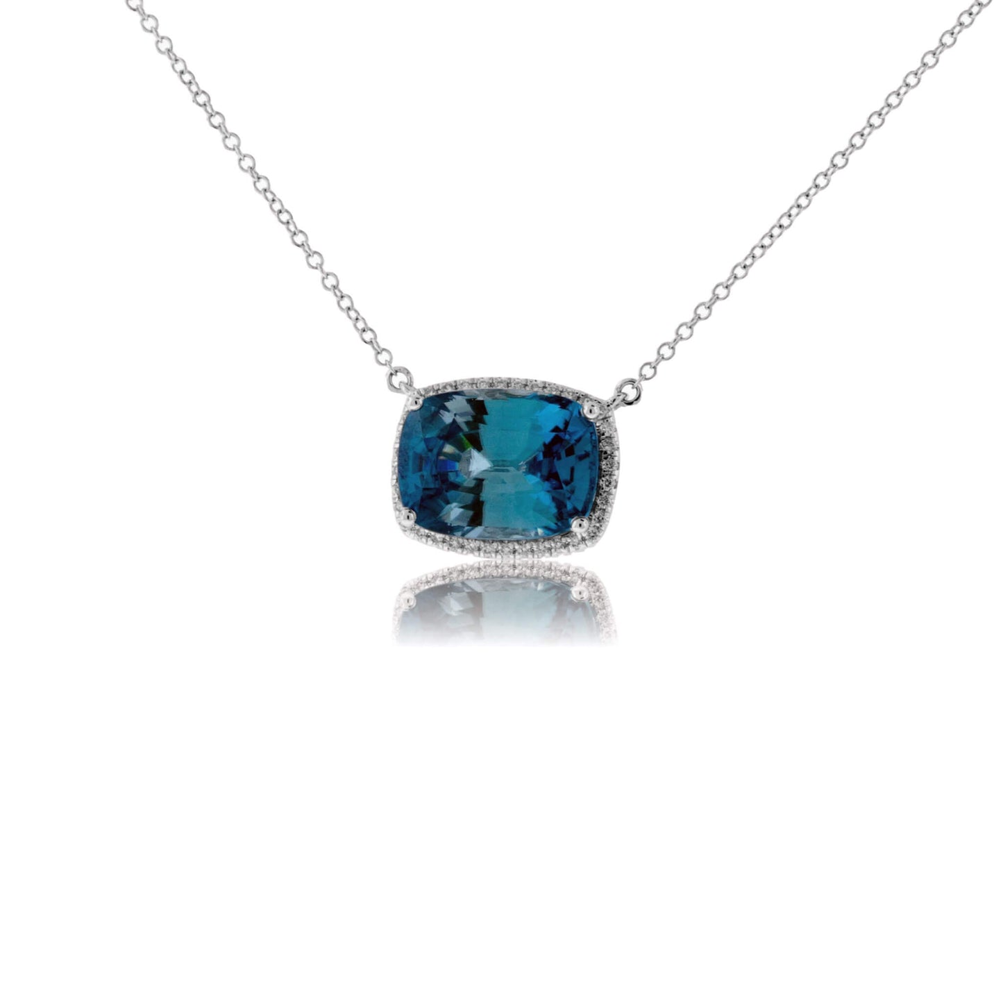 Stunningly Simple Blue Zircon and Diamond Halo Pendant - Park City Jewelers