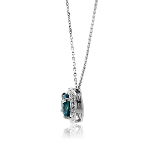 Stunningly Simple Blue Zircon in Diamond Halo Pendant - Park City Jewelers