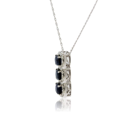 Three Blue Sapphire with Diamond Halo Pendant - Park City Jewelers
