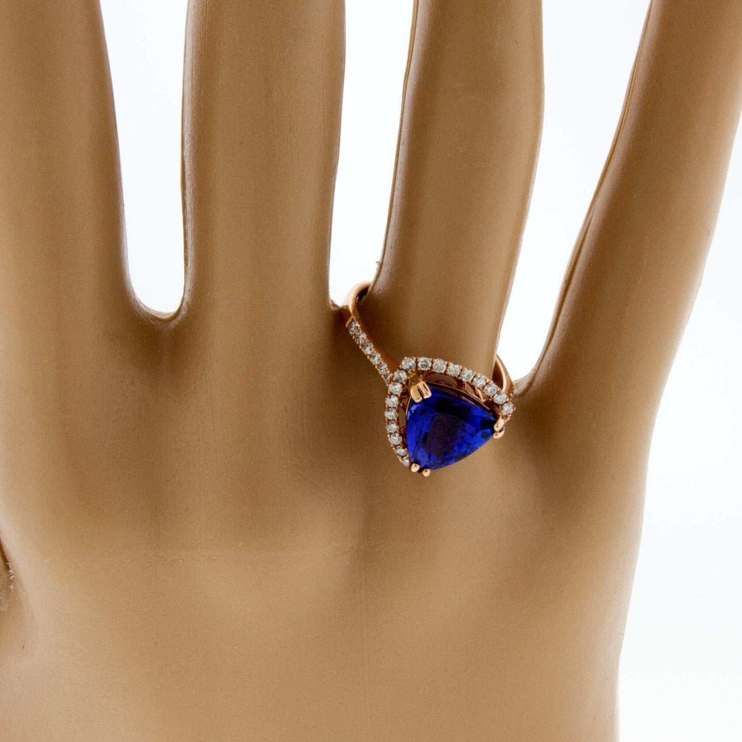 Trillion Tanzanite and Diamond Halo Ring in Rose Gold - Park City Jewelers
