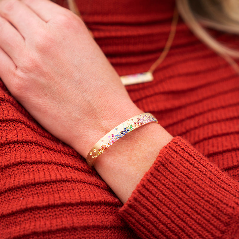Woman Wearing Confetti Bracelet and Pendant from Park City Jewelers