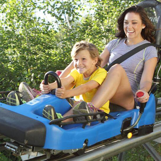 Woman and child on Alpine Slide
